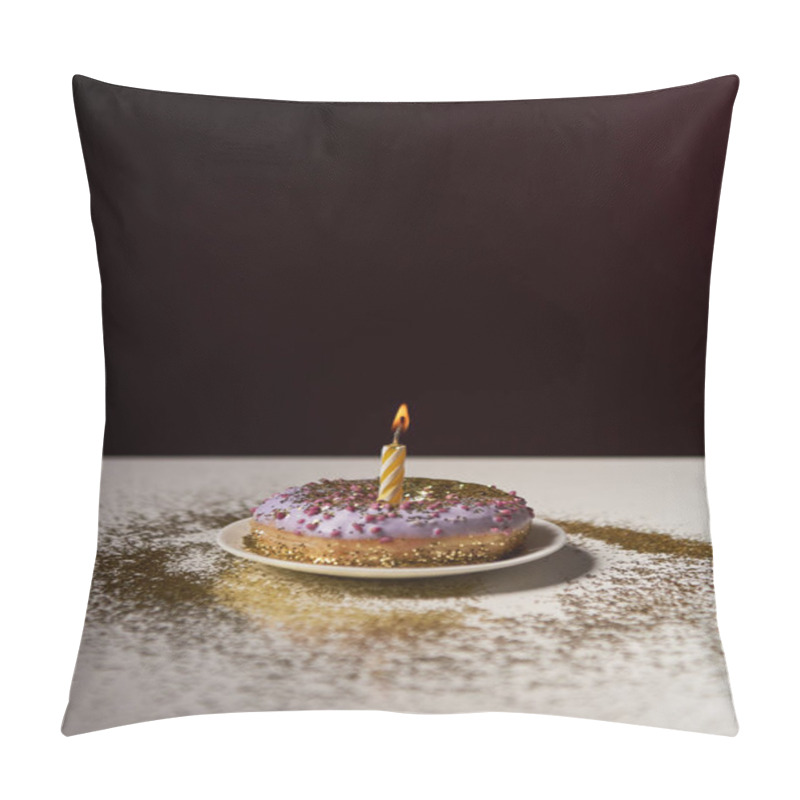 Personality  Candle In Middle Of Sweet Donut With Shiny Sparkles On White Table Isolated On Black Pillow Covers