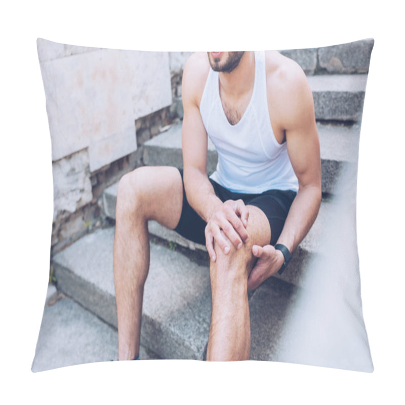 Personality  Partial View Of Sportsman Sitting On Stairs And Suffering From Pain While Touching Injured Knee Pillow Covers