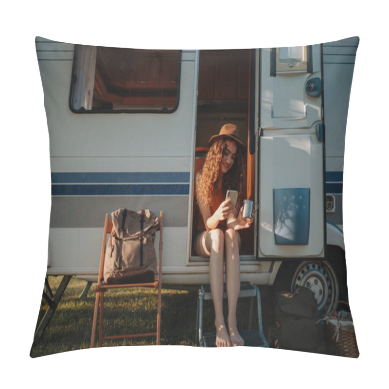 Personality  Portrait Of Young Beautiful Woman On A Camping Trip In Nature, Sitting On Caravan Steps With Smartphone And Coffee In Her Hand. Pillow Covers