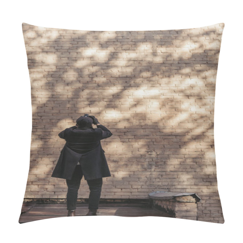 Personality  Back View Of Stylish Man With Camera Taking Photo Of Brrick Wall With Tree Shadows Pillow Covers