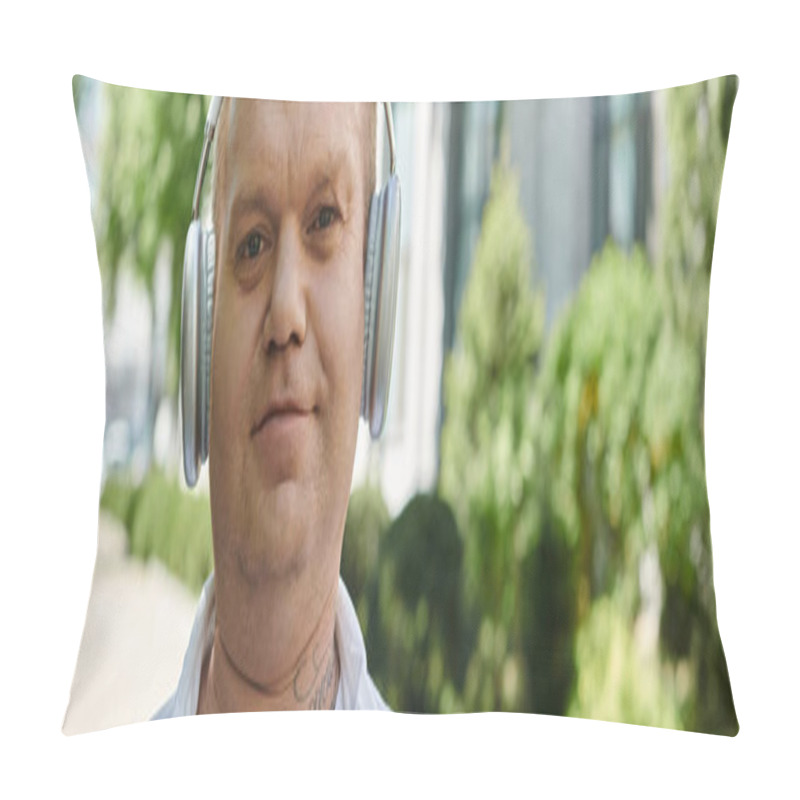 Personality  A Man With Inclusivity Walks In A City Setting, Lost In His Own World While Listening To Music Through Headphones. Pillow Covers