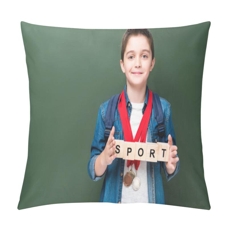 Personality  Schoolboy With Medals Holding Wooden Cubes With Word Sport Near Blackboard Pillow Covers