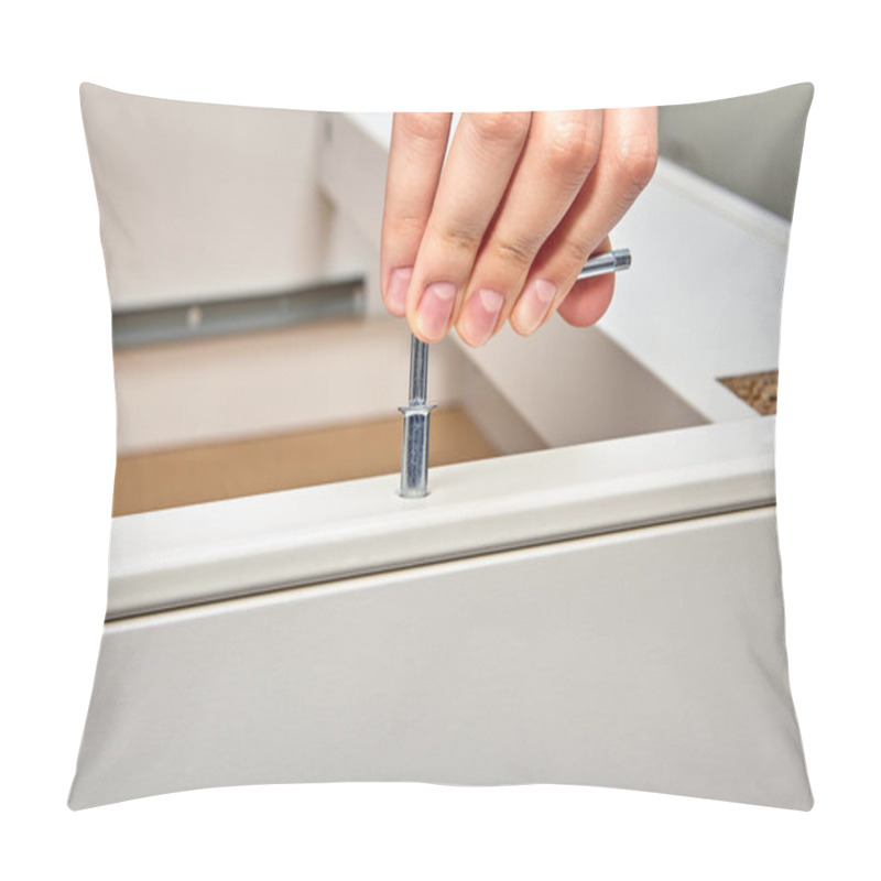 Personality  The Handyman Tightens The Steel Cam Dowel Into The Part Of The Table Made Of Particle Board With A Hex Key, Flat Pack Furniture Assembly. Pillow Covers