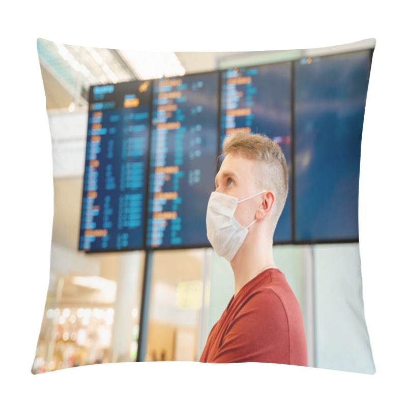 Personality  A Man In A Protective Mask Stands At The Airport Against The Background Of The Departure And Arrival Board Pillow Covers