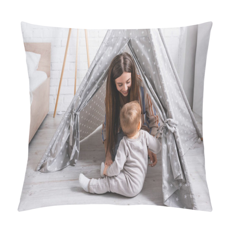 Personality  Happy Mother Looking At Baby Son Sitting Near Tipi In Bedroom  Pillow Covers