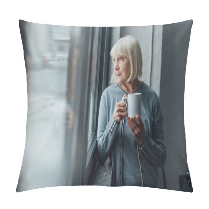 Personality  Pensive Senior Woman Holding Cup Of Coffee And Looking Through Window At Home  Pillow Covers