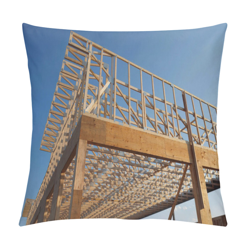 Personality  Wooden Roof And Wall Frame Of An Unfinished House Under Construction, Showcasing Beams, Planks, And Structural Design Against A Clear Blue Sky. Pillow Covers