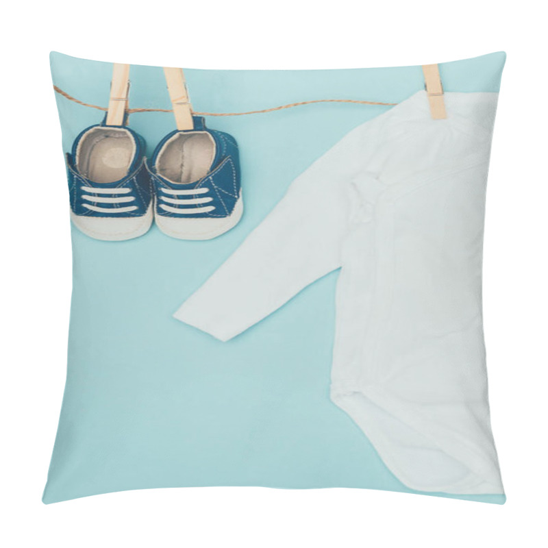 Personality  Top View Of Baby Bodysuit And Shoes Drying On Rope Isolated On Blue Pillow Covers