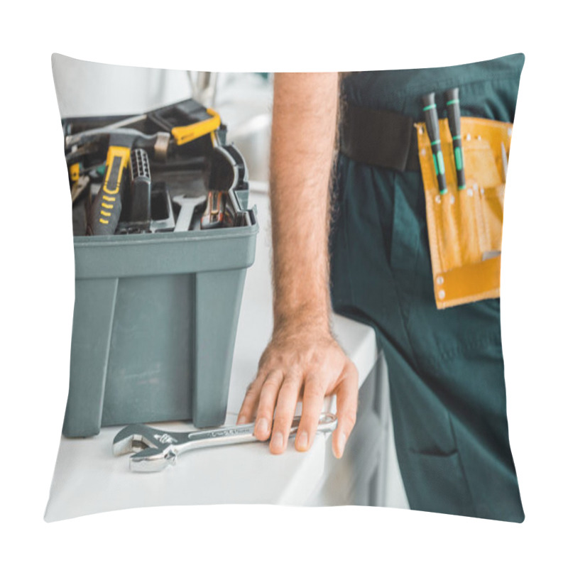 Personality  Cropped Image Of Plumber Leaning On Kitchen Counter And Touching Adjustable Wrench In Kitchen Pillow Covers