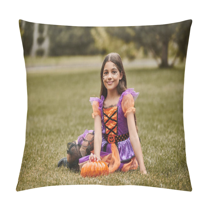 Personality  Happy Girl In Halloween Costume Sitting In Vibrant Dress Near To Decorative Pumpkin On Green Grass Pillow Covers