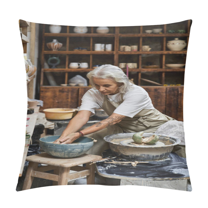 Personality  A Focused Artist Is Molding Clay On A Pottery Wheel In A Rustic Workshop Filled With Art Tools. Pillow Covers