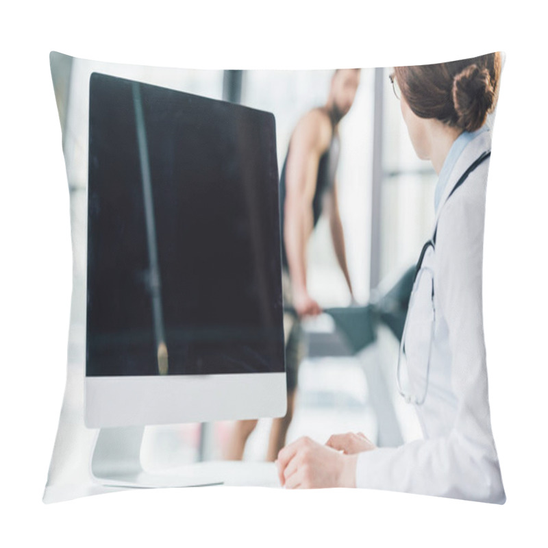 Personality  Selective Focus Of Doctor Sitting Near Computer With Blank Screen In Gym Pillow Covers