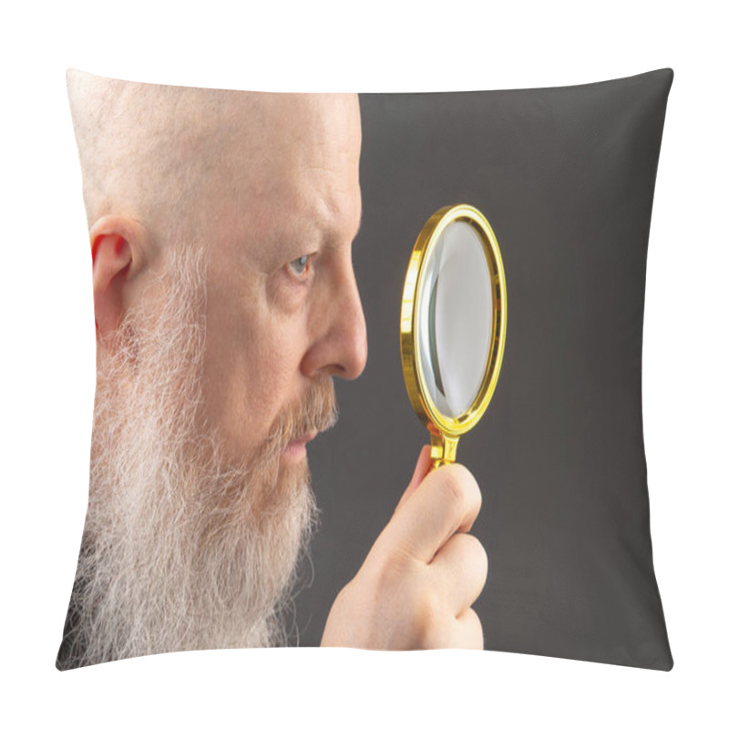 Personality  Serious Man With A Long Gray Beard Looks Through A Magnifying Glass On A Dark Gray Background. Search And Research Concept. Detective Agency Pillow Covers