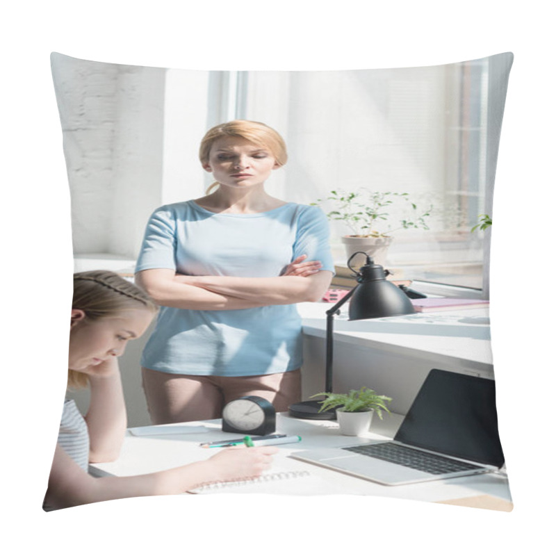 Personality  Sad Teen Daughter Doing Homework While Her Mother Standing With Crossed Arms On Background Pillow Covers