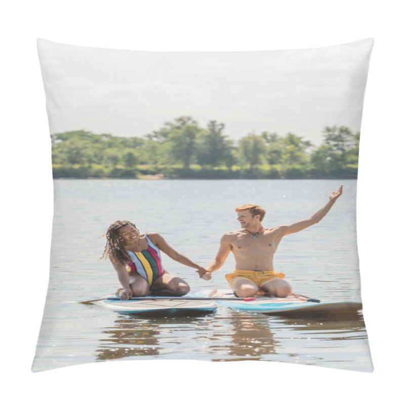 Personality  Carefree Redhead Man Holding Hands With Cheerful African American Woman And Pointing Away While Sitting On Sup Boards On Lake With Green Picturesque Bank Pillow Covers