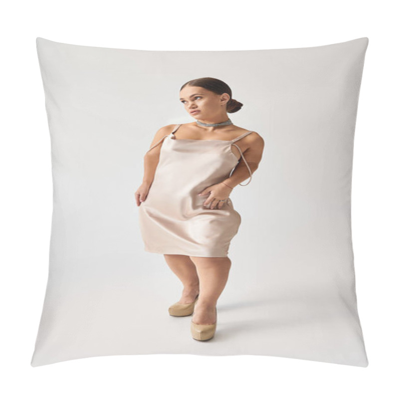 Personality  A Young Woman With Short Stature Presents A Beautiful Dress In A Studio, Highlighting Inclusion. Pillow Covers