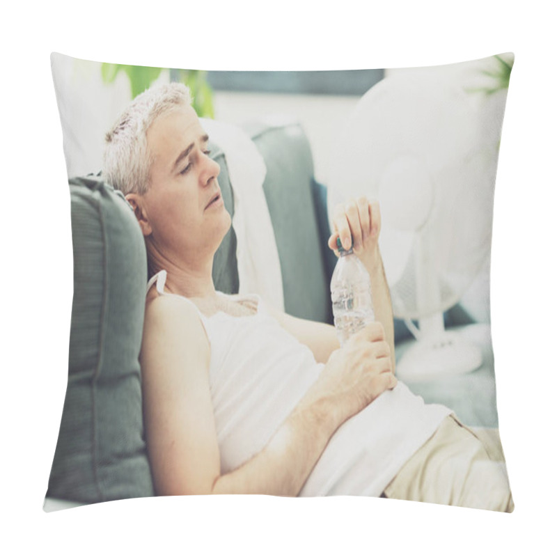 Personality  Exhausted Man Resting On The Couch At Home During A Heatwave, He Is Drinking Water And Suffering From The Heat Pillow Covers