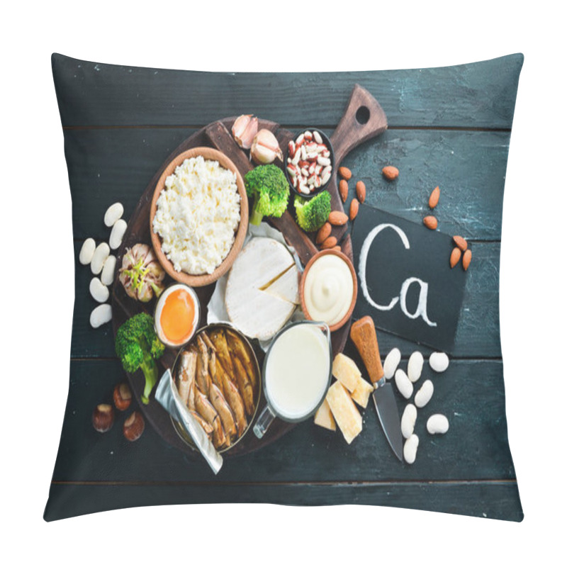 Personality  Products Containing Natural Calcium: Cheese, Milk, Parmesan, Sour Cream, Fish, Almonds, Parsley, Garlic, Broccoli. On A Black Wooden Background. Top View. Free Copy Space. Pillow Covers