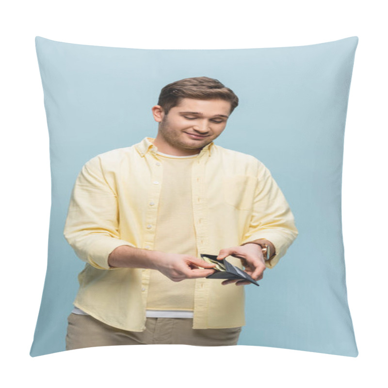 Personality  Happy Young Man In Yellow Shirt Holding Wallet With Dollars Isolated On Blue Pillow Covers