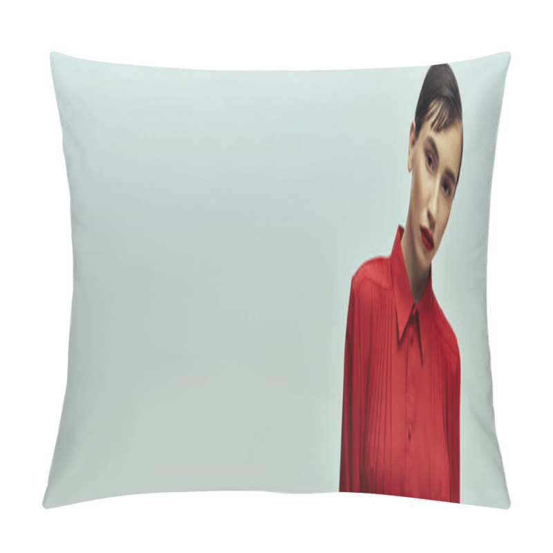 Personality  A Young Woman With Short Hair Poses Against A Grey Background. She Wears A Red Blouse Pillow Covers