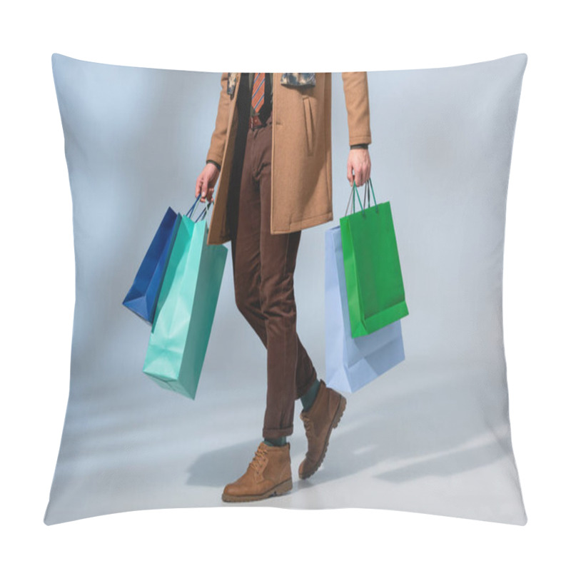 Personality  Cropped View Of Customer In Coat Holding Paper Bags On Grey Pillow Covers