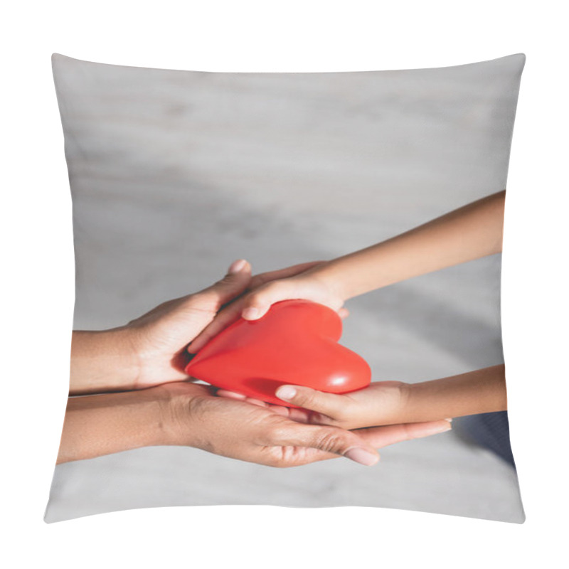 Personality  High Angle View Of Red Heart Model In Cupped Hands Of African American Mother And Child Pillow Covers