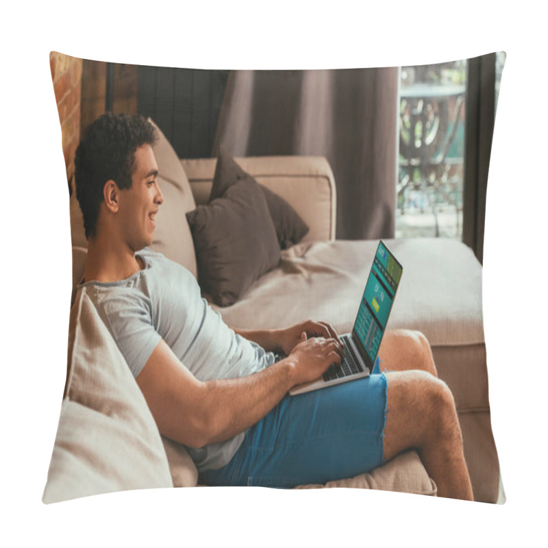 Personality  Happy Mixed Race Man Chilling And Using Laptop With SportsBet Website On Screen During Self Isolation Pillow Covers