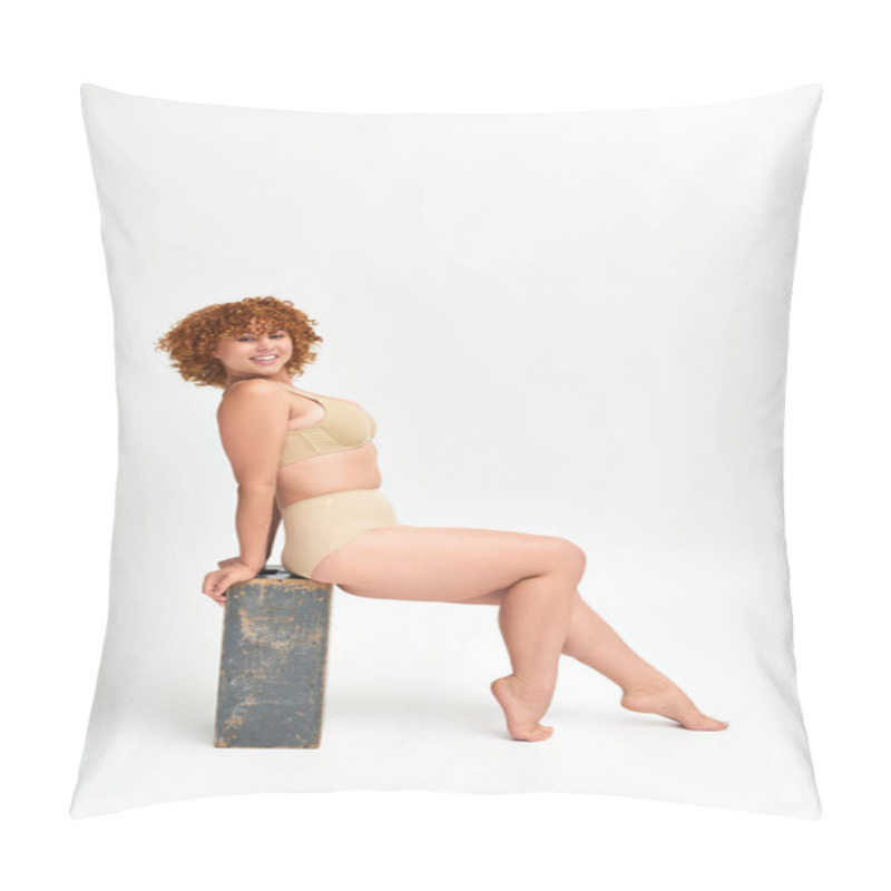 Personality  Redhead Plus Size Woman In Beige Underwear Sitting And Smiling On Wooden Box On White, Full Length Pillow Covers