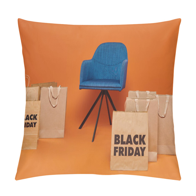 Personality  Shopping Bags With Black Friday Letters Near Blue Velour Armchair On Orange Backdrop, Sales Season Pillow Covers