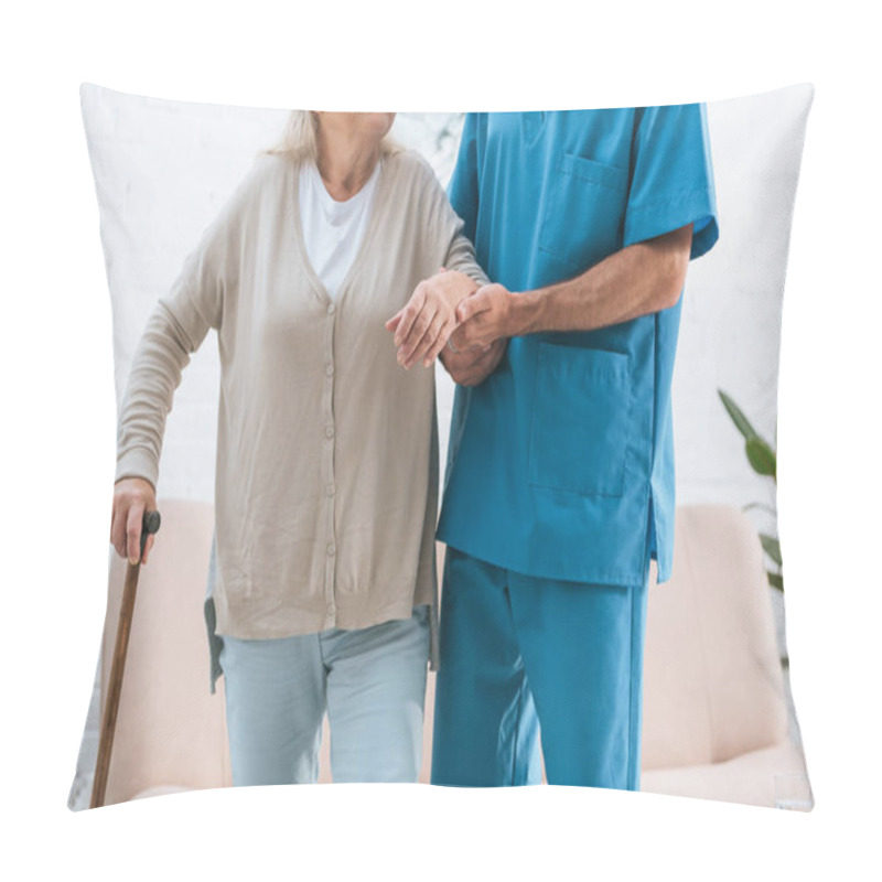 Personality  Cropped Shot Of Male Nurse Supporting Senior Woman With Walking Cane Pillow Covers