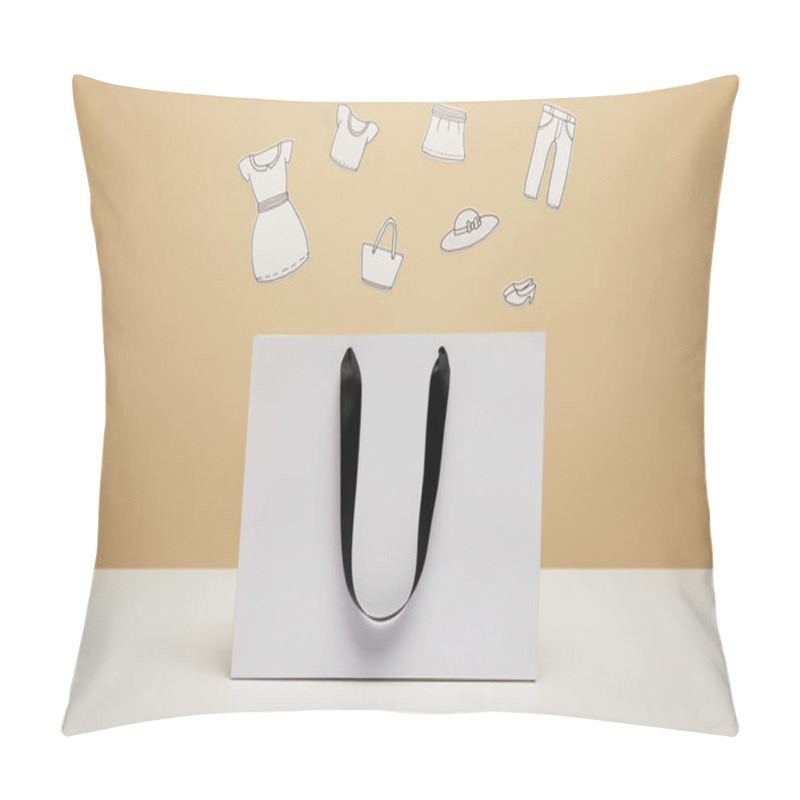 Personality  Paper Clothes Above White Shopping Bag On White Table Isolated On Beige Pillow Covers