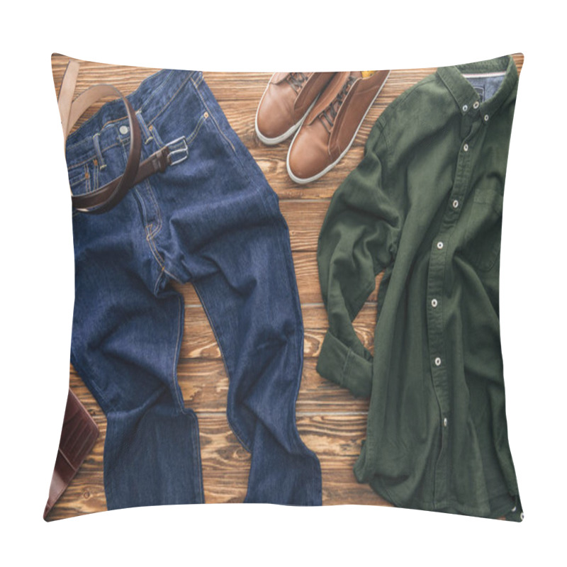 Personality  Top View Of Green Shirt, Shoes And Jeans On Wooden Background Pillow Covers