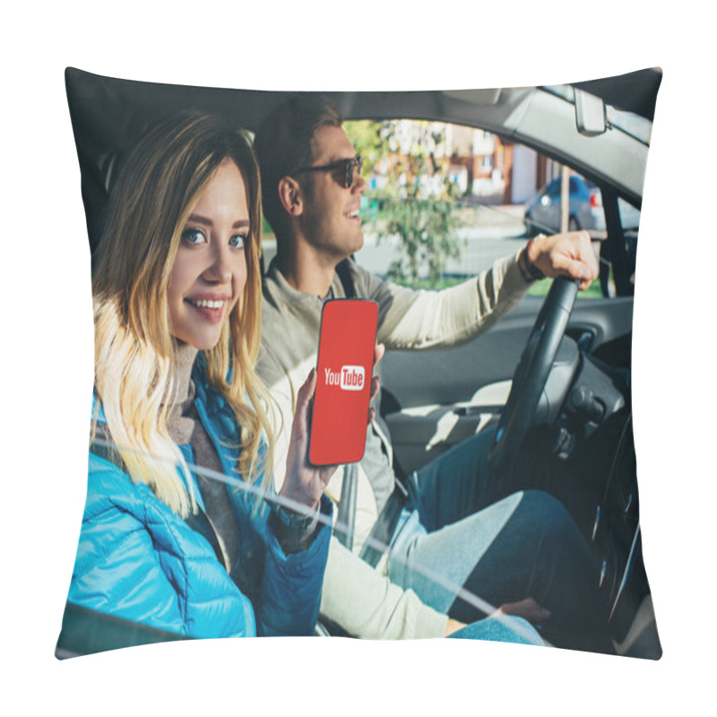 Personality  Smiling Woman Showing Smartphone With Youtube Logo On Screen While Husband Driving Car Pillow Covers