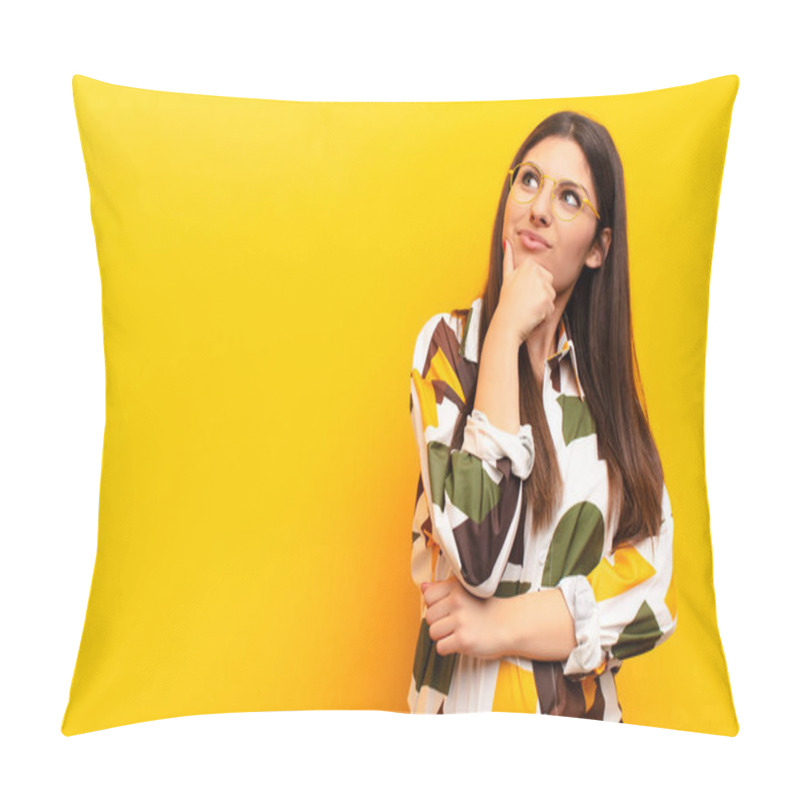 Personality  Young Pretty Woman Feeling Thoughtful, Wondering Or Imagining Ideas, Daydreaming And Looking Up To Copy Space Against Yellow Wall Pillow Covers