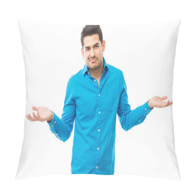 Personality  Portrait Of Unsure Man Wearing Blue Shirt While Shrugging His Shoulders Over White Background Pillow Covers