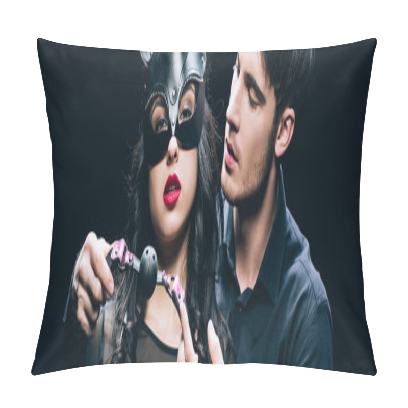 Personality  Panoramic Shot Of Handsome Young Man Holding Gag Near Sexy Woman In Mask And Bdsm Costume Isolated On Black Pillow Covers