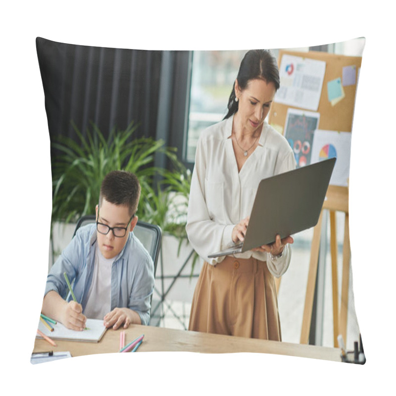 Personality  A Mother Works On Her Laptop While Her Son With Down Syndrome Colors In A Notebook At Their Office Desk. Pillow Covers