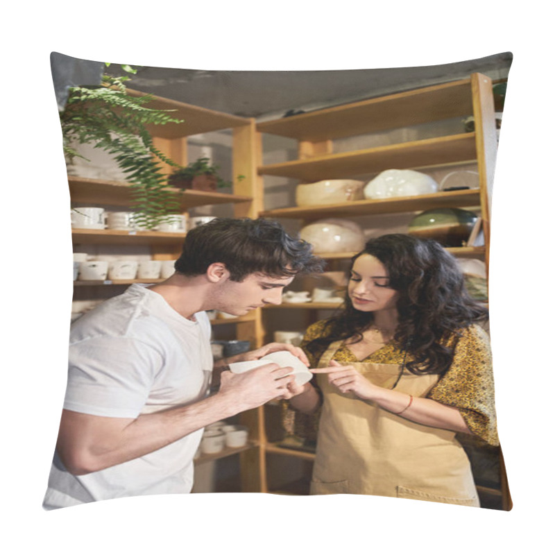 Personality  A Couple Joyfully Collaborates On Pottery In A Stylish Workshop. Pillow Covers