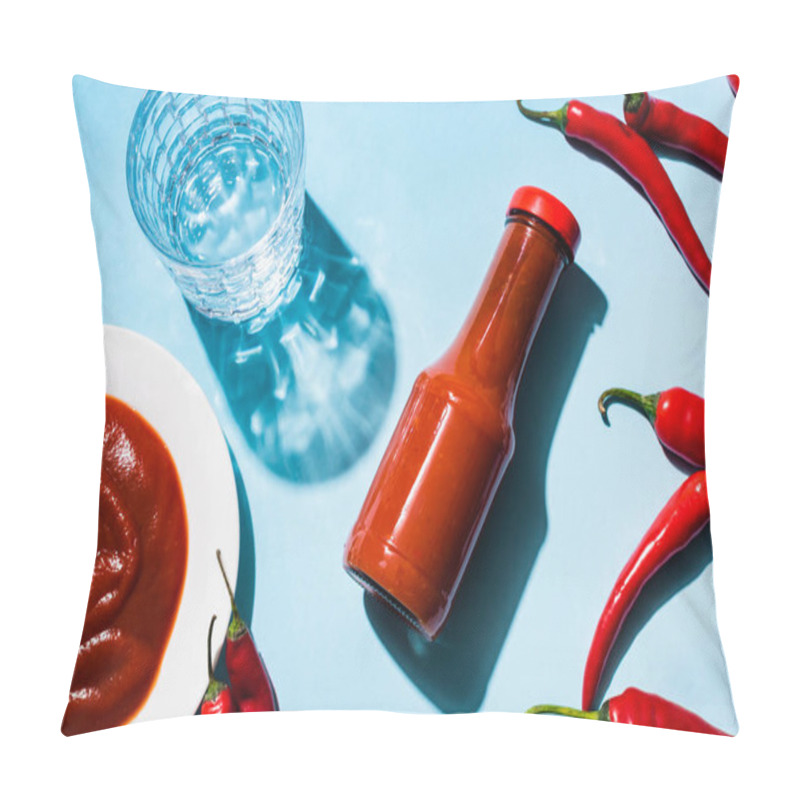 Personality  Top View Of Chili Sauce In Bottle And Plate With Chili Peppers And Glass Of Water On Blue Background Pillow Covers