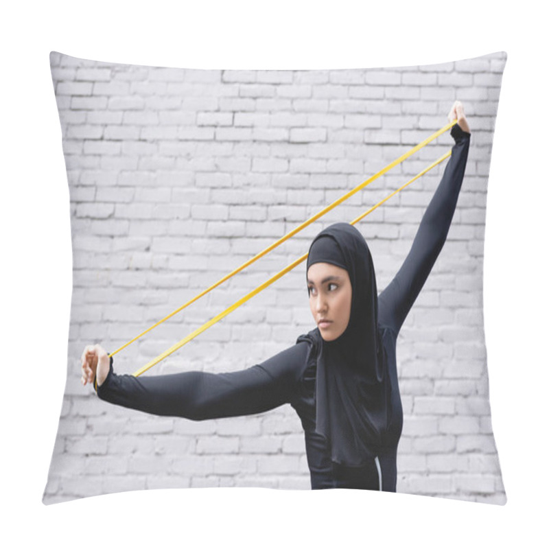 Personality  Arabian Sportswoman In Hijab Exercising With Resistance Band Near Brick Wall Pillow Covers