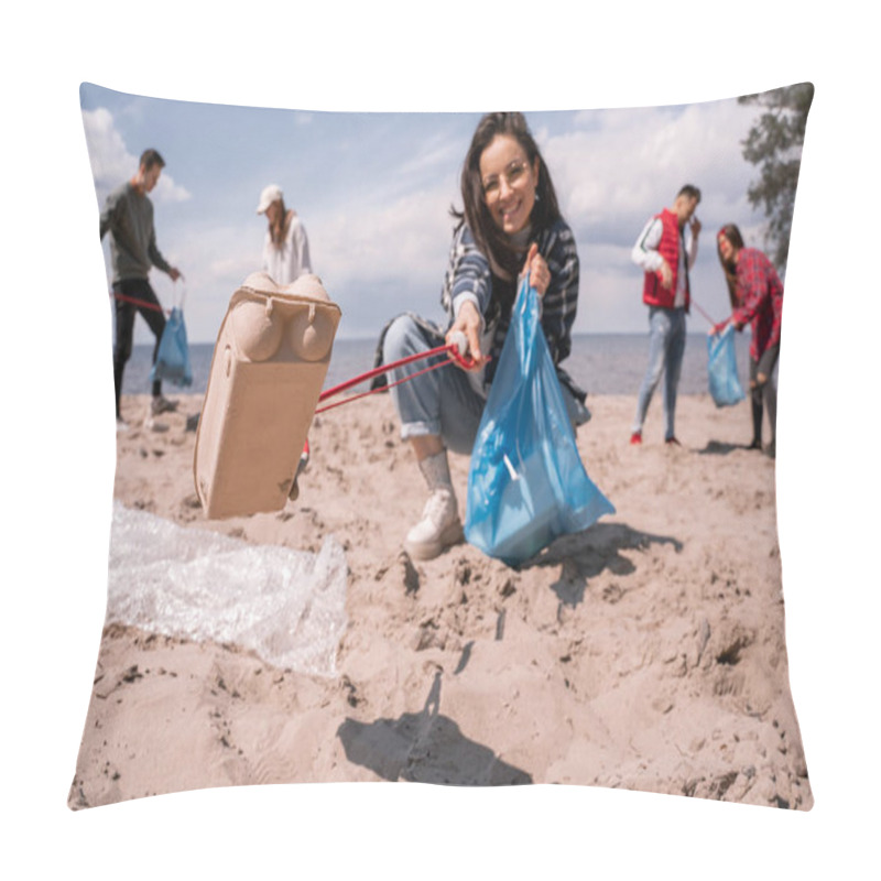 Personality  Blurred Young Woman Collecting Rubbish With Grabber Near Group Of Volunteers  Pillow Covers