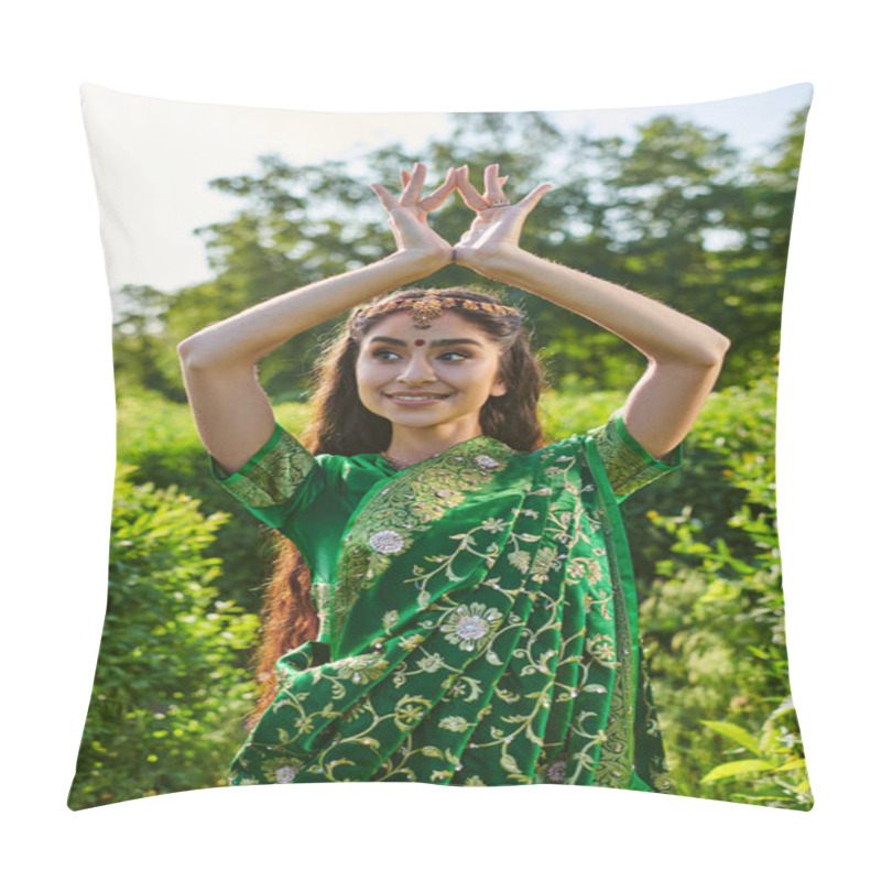 Personality  Cheerful Young Indian Woman In Green Sari And Bindi Gesturing Near Plants In Park Pillow Covers