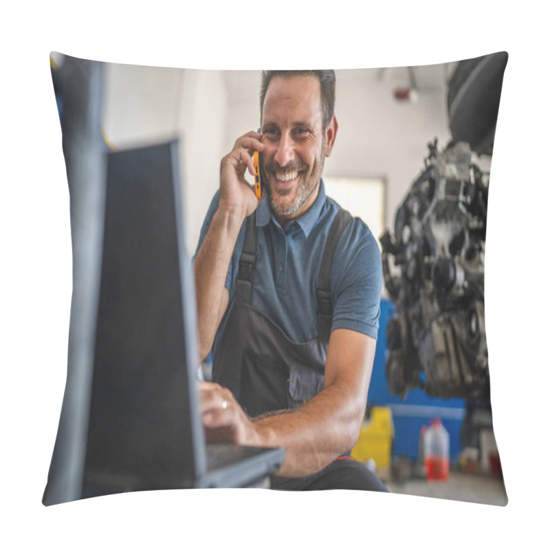 Personality  A Car Mechanic Is Multitasking, Work On His Laptop While Engaged In A Mobile Phone Call. He Is In A Garage Setting, Highlighting Modern Technology In Auto Repairs Pillow Covers