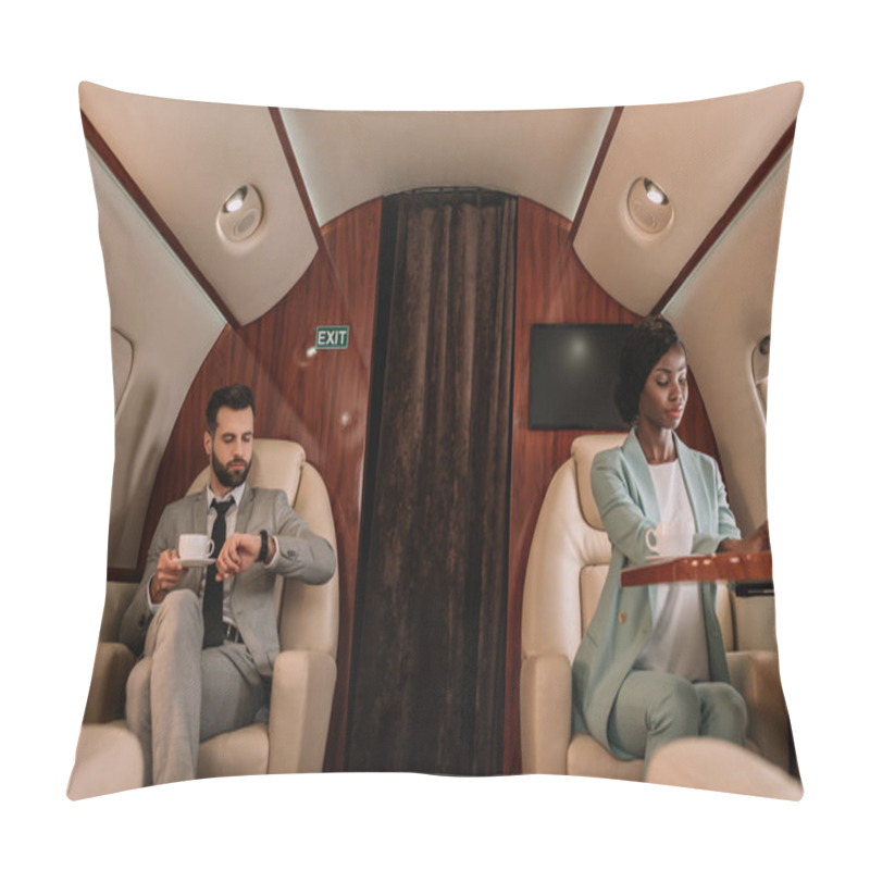 Personality  Attentive African American Businesswoman Typing On Laptop, And Businessman Looking At Wristwatch While Holding Cup Of Coffee Pillow Covers