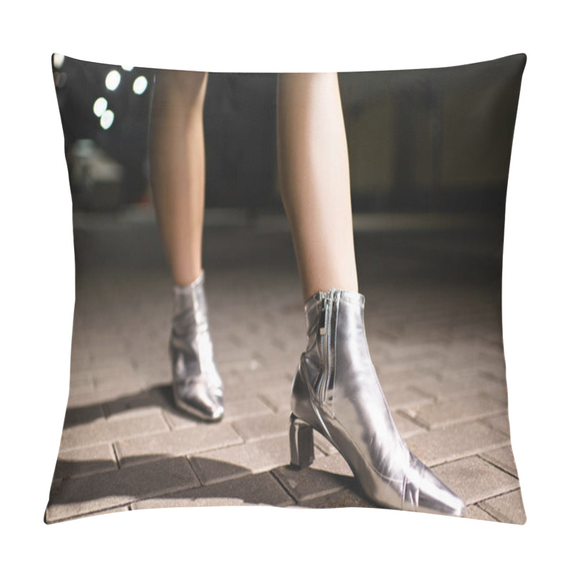 Personality  Cropped Shot Of Woman In Glossy Silver Boots Walking On Street At Night Pillow Covers