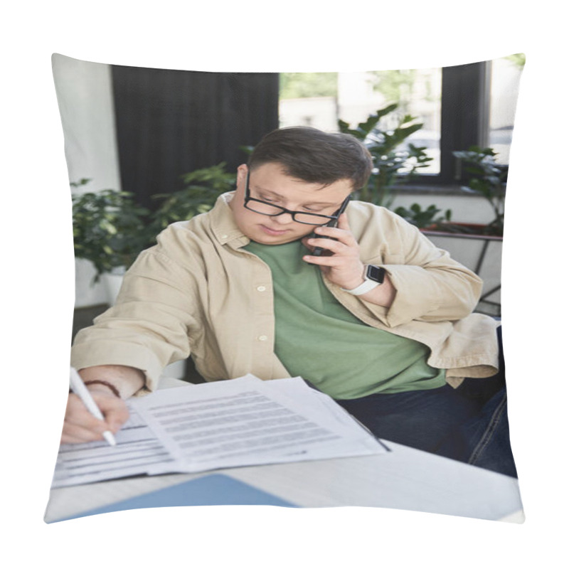 Personality  A Young Man With Down Syndrome Sits At A Desk, Taking Notes While On A Phone Call. Pillow Covers