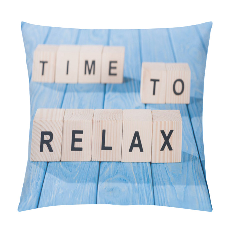 Personality  Close Up View Of Arranged Wooden Blocks Into Time To Relax Phrase On Blue Wooden Surface  Pillow Covers