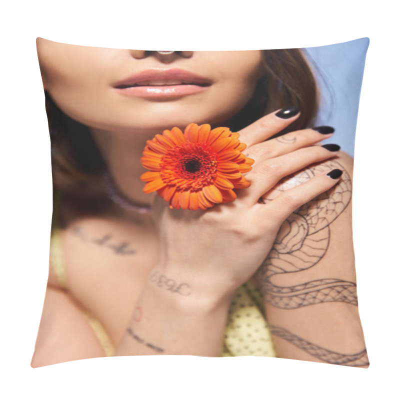 Personality  A Young Woman With Brunette Hair Gently Holds A Delicate Flower In Her Hand, Exuding Elegance And Grace. Pillow Covers