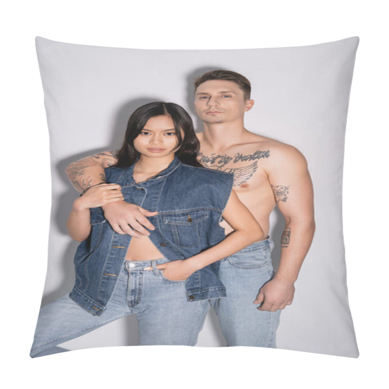 Personality  Shirtless Tattooed Man And Asian Woman In Denim Outfit Looking At Camera While Posing On Grey Background Pillow Covers