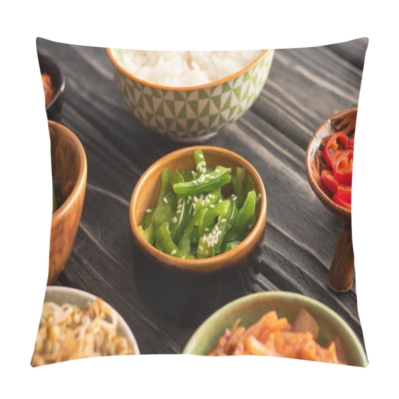 Personality  Selective Focus Of Sesame On Green Bell Peppers Near Rice And Korean Side Dishes On Wooden Surface  Pillow Covers